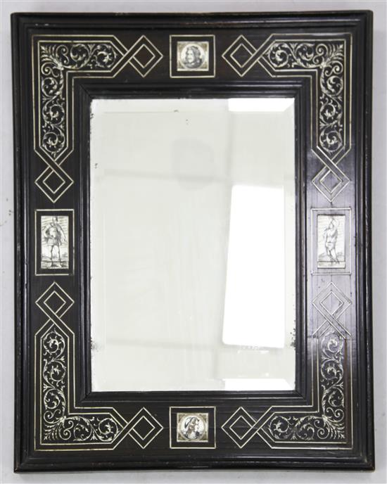 A 17th century Flemish style ivory inlaid ebonised wall mirror, W.1ft 6in. H.1ft 10in.
